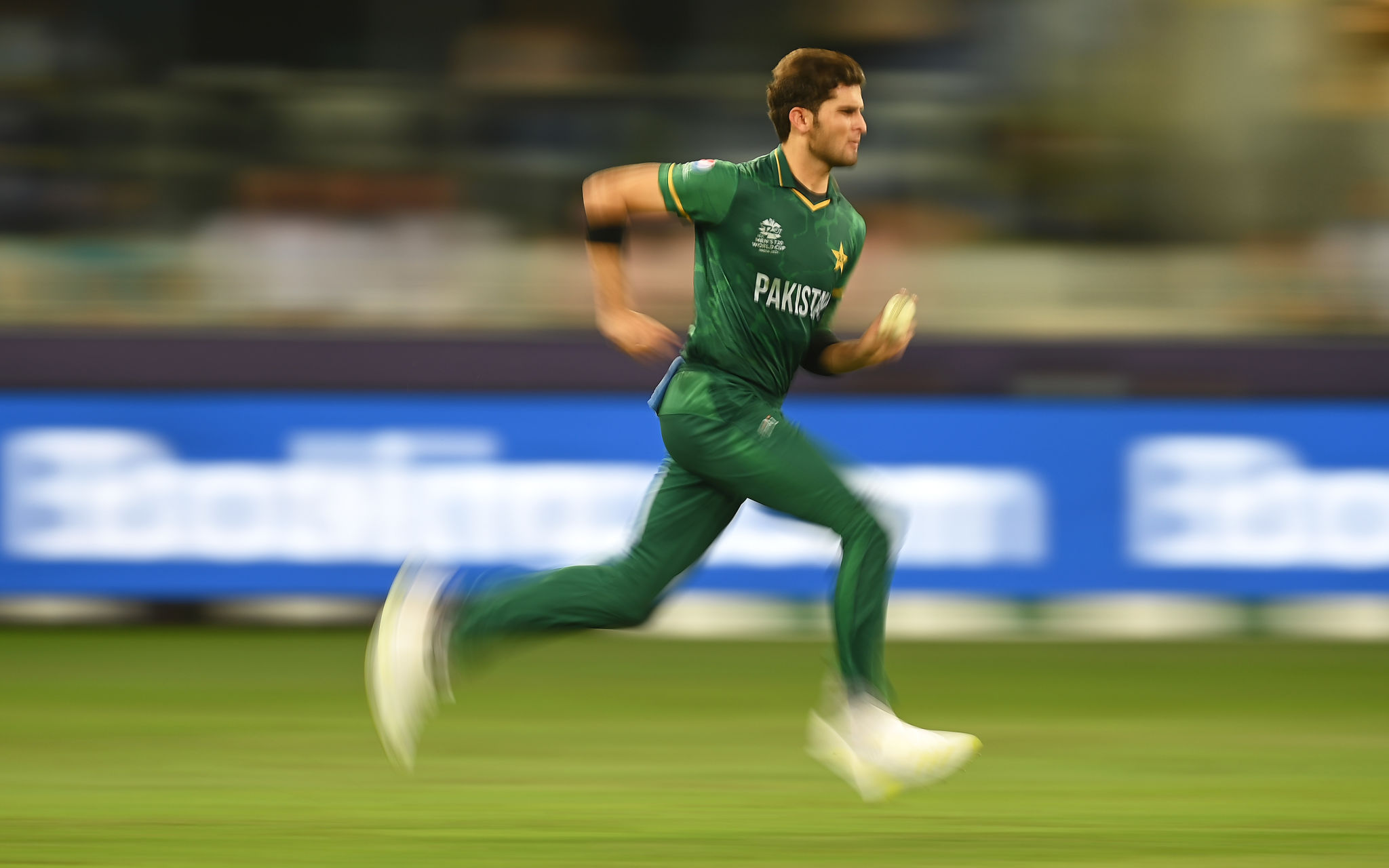Shaheen Afridi of Pakistan in bowling action during the ICC Men's T20 World Cup semi-final match between Pakistan and Australia at Dubai 