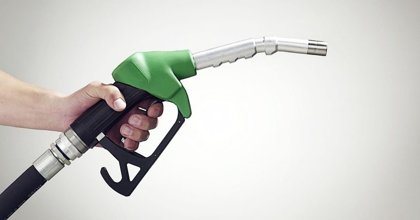 Man holding a petrol pump
